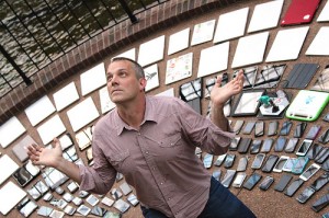 Man sitting in front of mobile devices